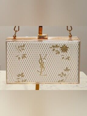 Yves Saint Laurent Gold and White Clutch